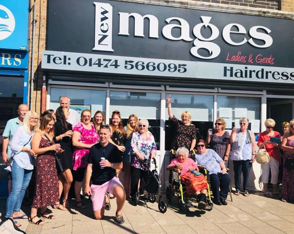 Friends and clients outside the shop on the last day. Picture: Hannah Beachem