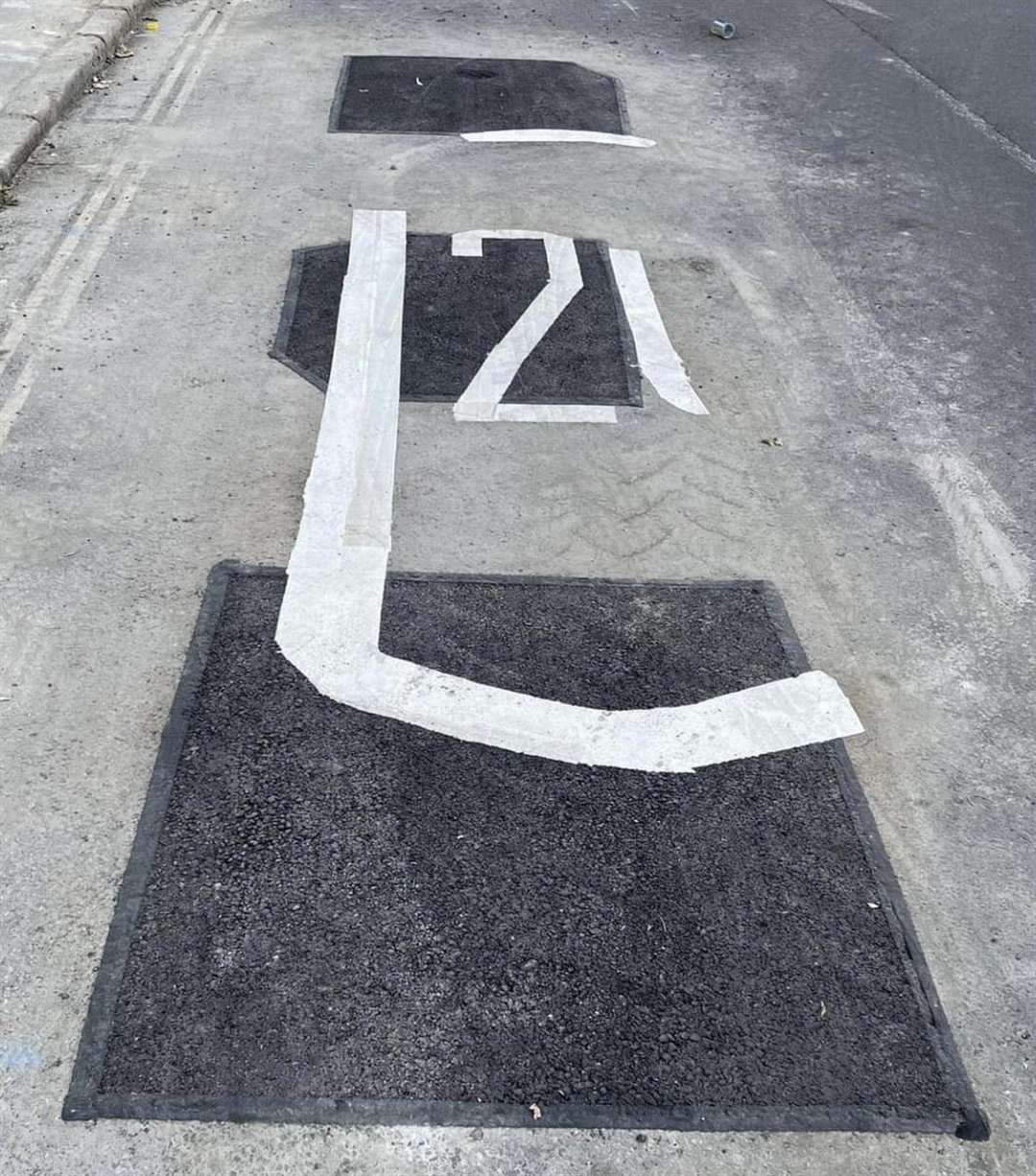 The half-finished road marking in New Street, Sandwich, has been labelled a "joke"