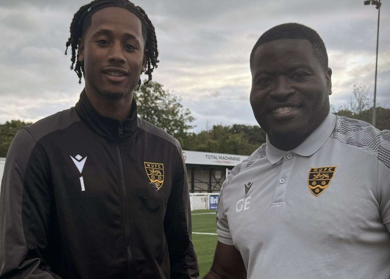 New Maidstone United No.1 Alexis Andre Jr with manager George Elokobi. Picture: MUFC