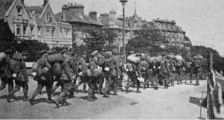 Soldiers in the First World War heading towards the steep hill of The Road of Remembrance in Folkestone to sail for the Western Front. Picture: Ann Berry, Step Short