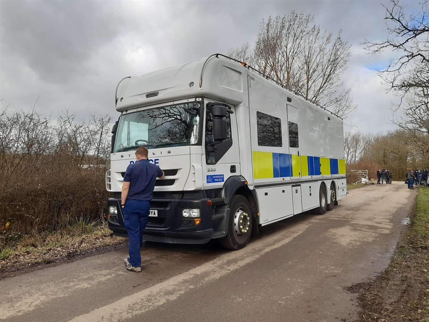 Police divers arrive at Great Chart on the second day of the search