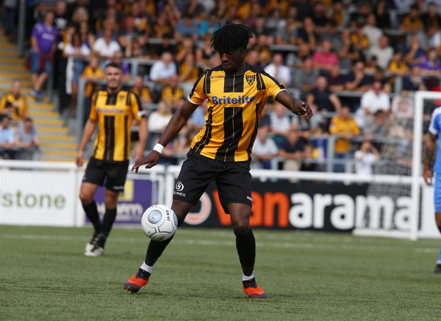 Andre Coker in action for parent club Maidstone Picture: Andy Jones