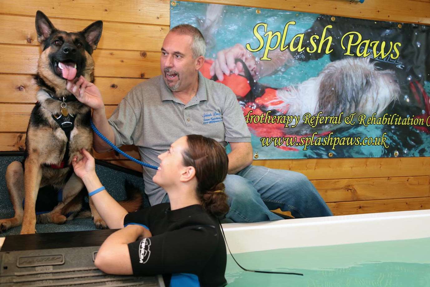 Graham Cooper and Sian Harbord at the hydro pool with Max the dog