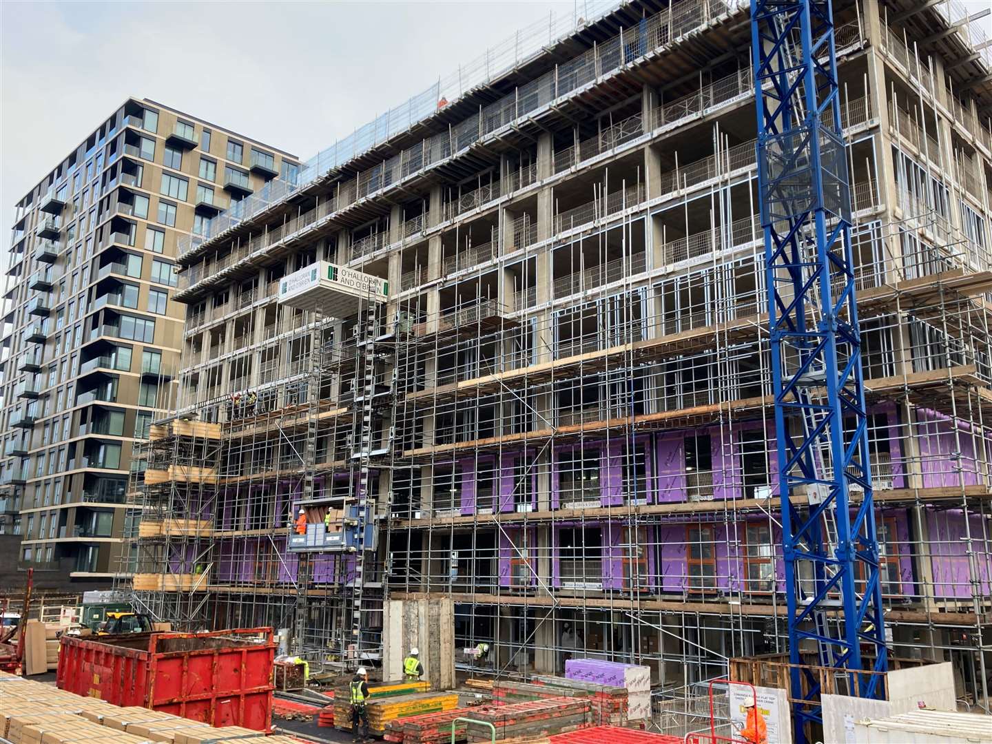 The first of two buildings is now built up to roof level