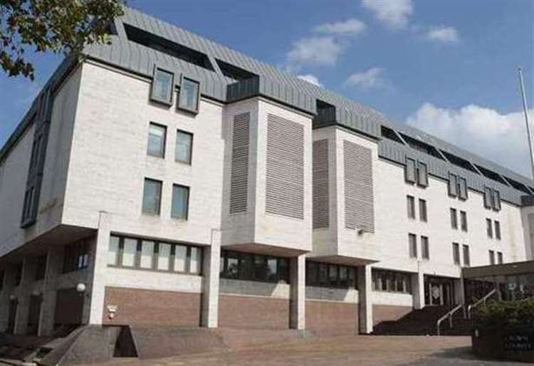 He appeared alongside his wife and son at Maidstone Crown Court