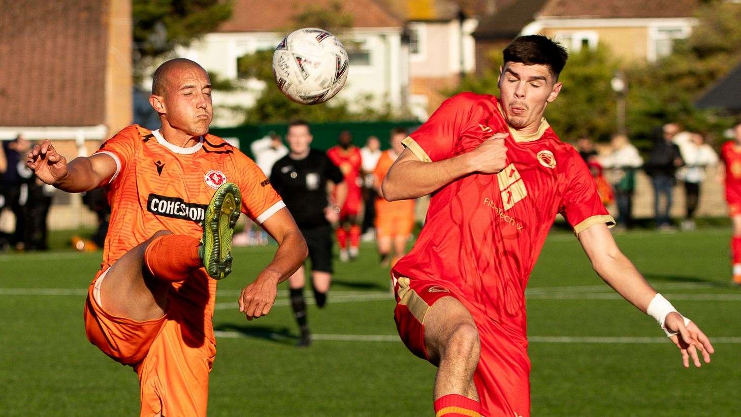 Whitstable striker Harvey Smith battles with Punjab United defender Chris Edwards. Picture: Les Biggs