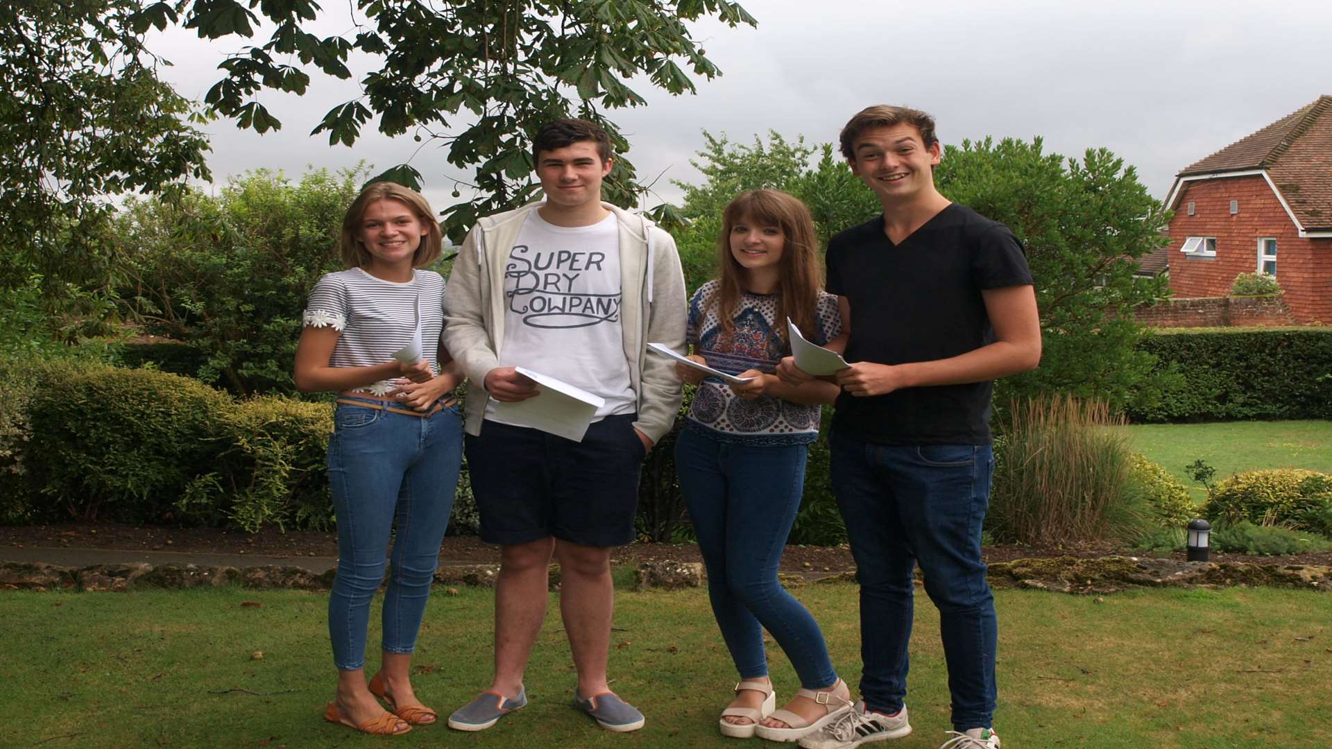 Jessica Grindlay, William Grabowski, Emelia Browning Sam Gray celebrate their results at Sutton Valence School