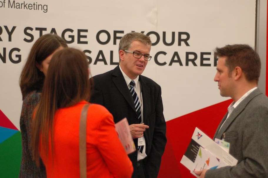 Delegates talk to an exhibitor at Kent 2020 Vision Start-Up LIVE in Kent Event Centre, Detling.