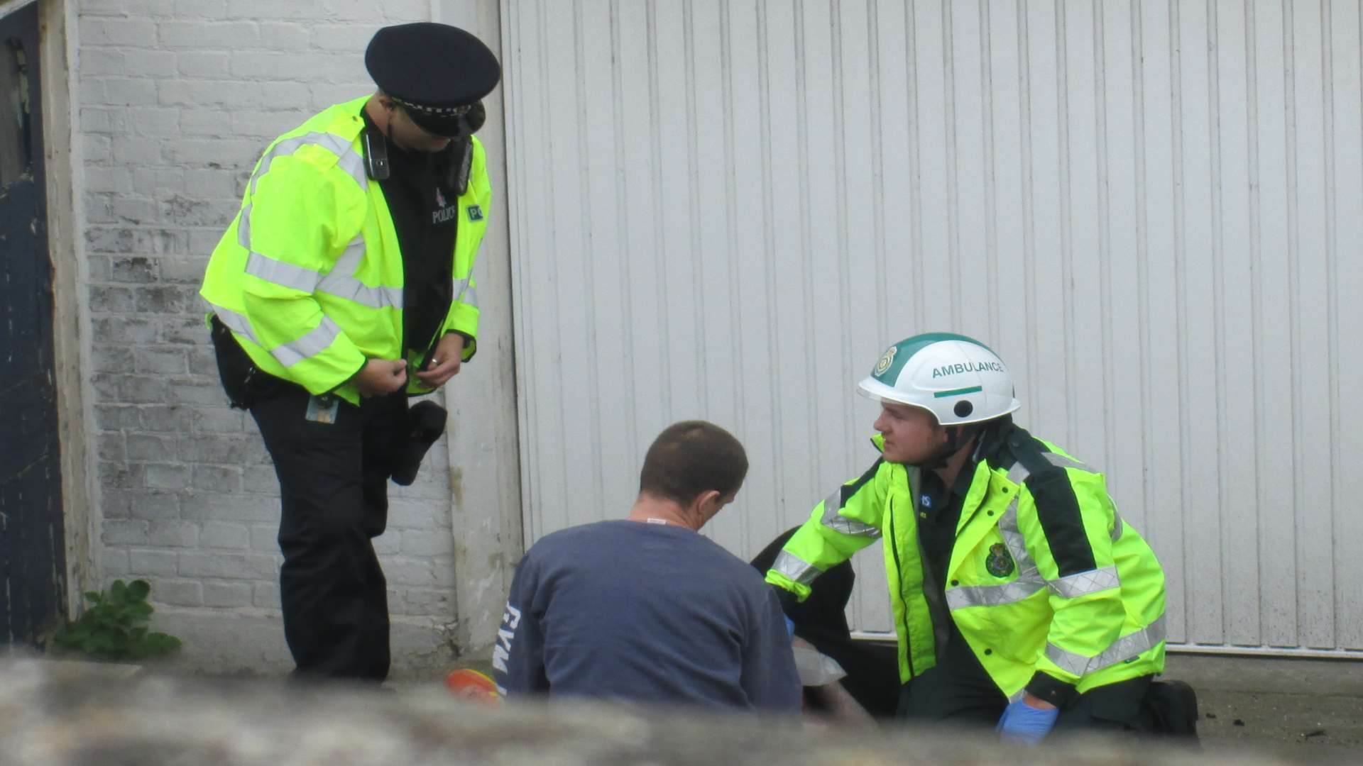 A casualty is treated at the scene of the fire in Sheerness