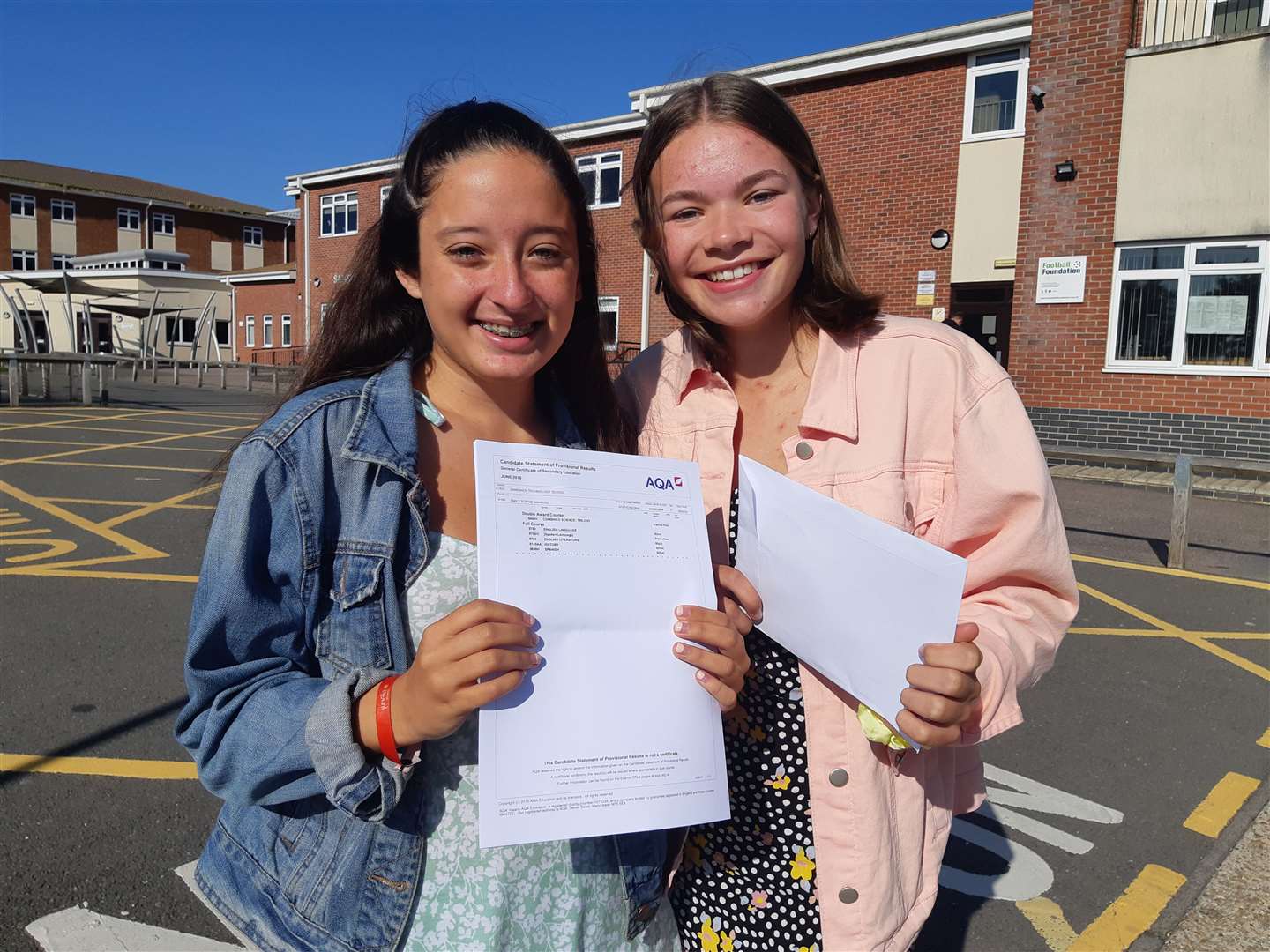 Emily Manning and Isobelle Brooman arrived to pick up their results at 9am as soon as the school doors opened