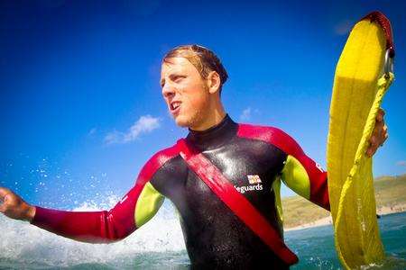 Lifeguard in the surf. Picture: Nathan Williams, RNLI.