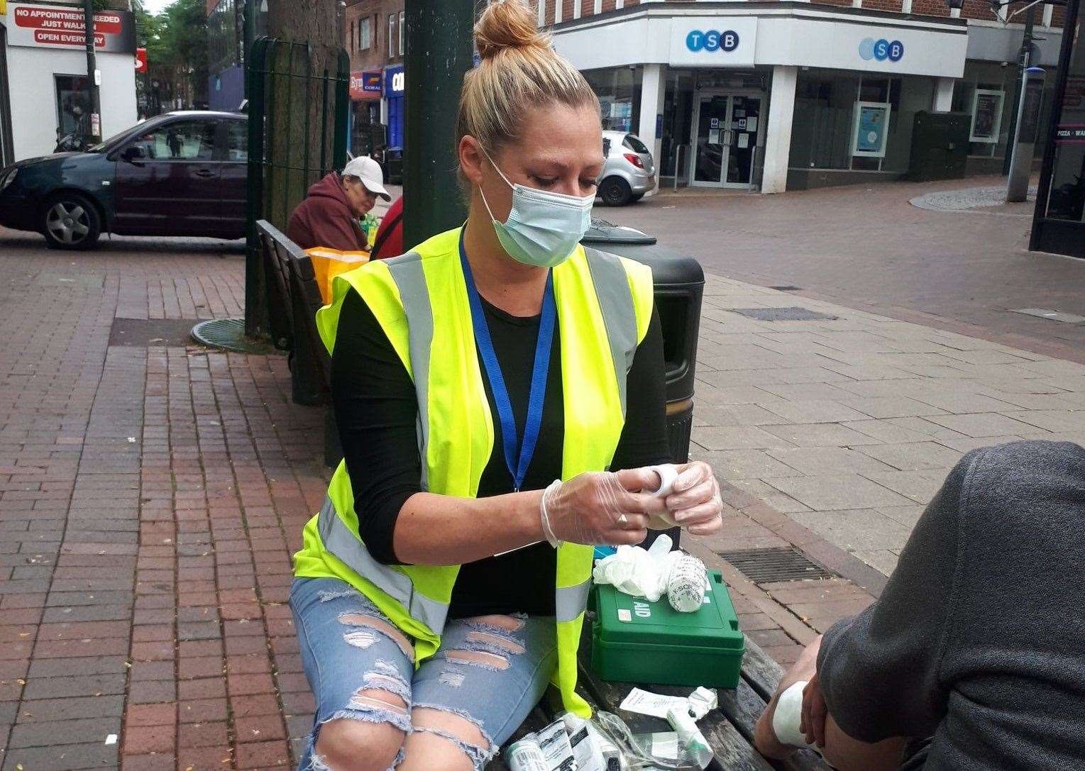 A One Big Family volunteer provides first aid to a rough sleeper in Medway