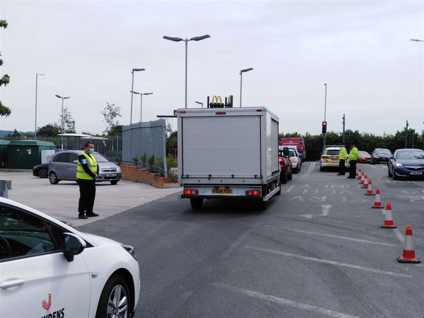 Officers were seen wearing masks as they directed traffic