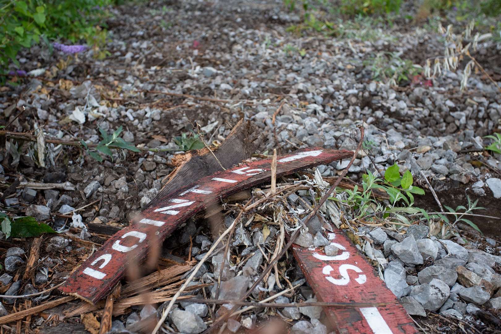 Signs lay abandoned, not having been used for many years