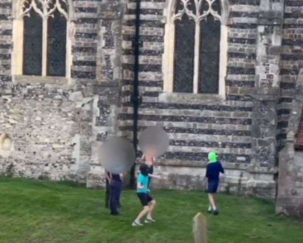 The boys damaged roof tiles and windows at St Helen's Church in Cliffe