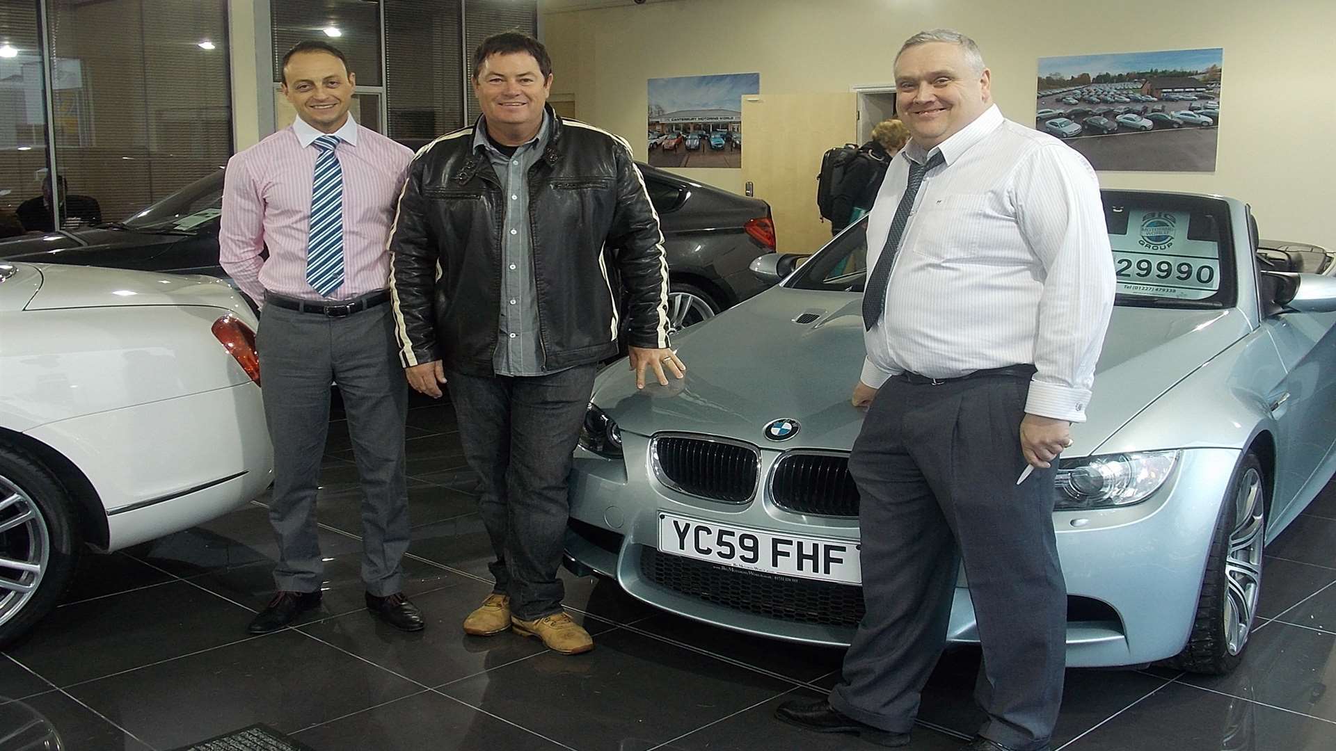 Big Motoring World general manager Darren Nafi, Mike Brewer and owner Peter Waddell