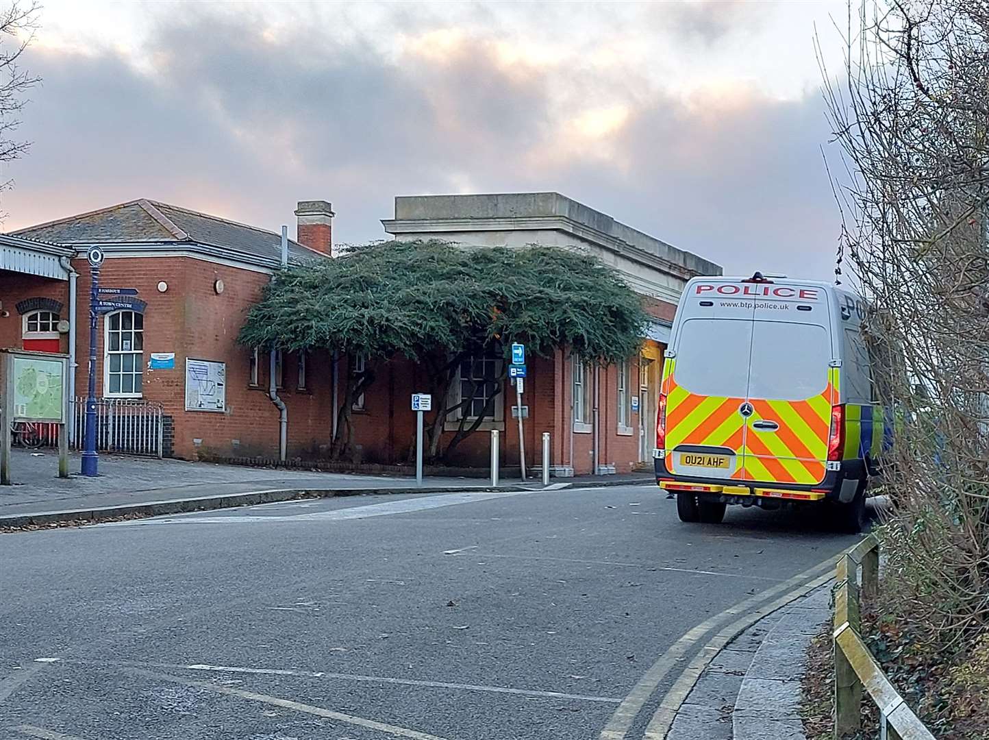 Police outside Whitstable train station yesterday morning after a stabbing