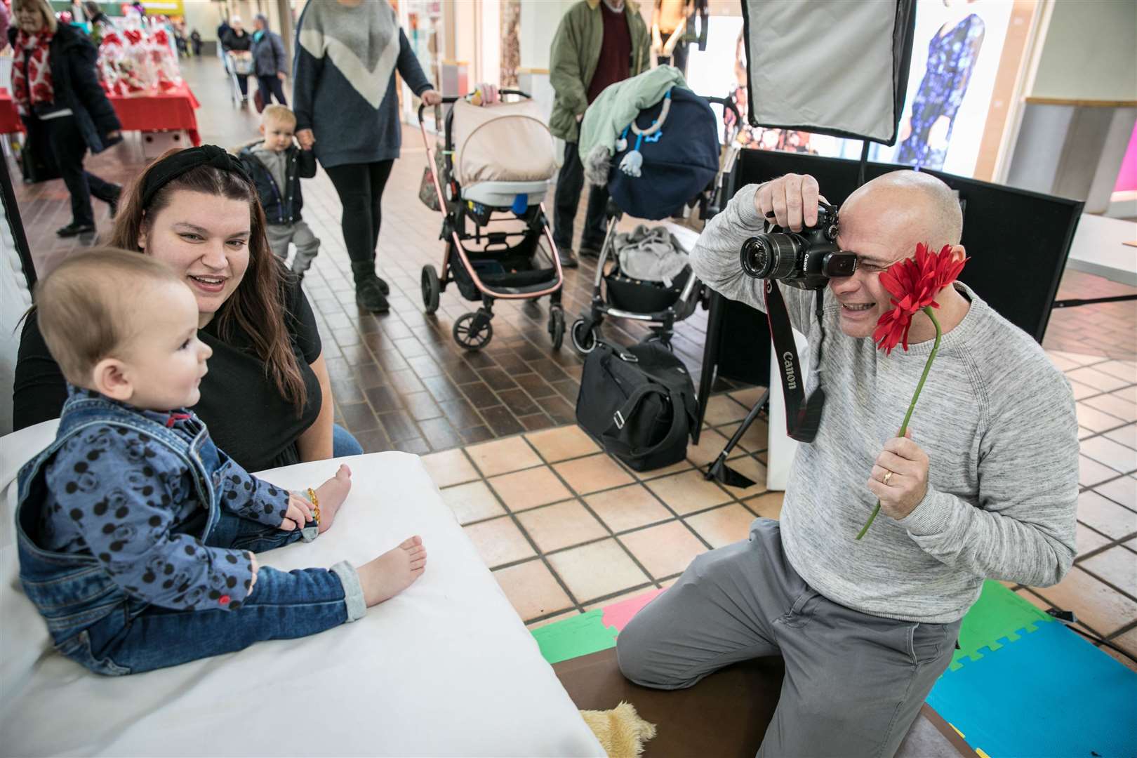 Photographer Andy Nield photographs Jacob Devlin, 8 months, with mum Tania Devlin. Picture: Matthew Walker (28867397)