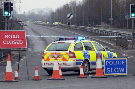 Police at the scene of the motorbike crash in Romney Marsh Road, Ashford