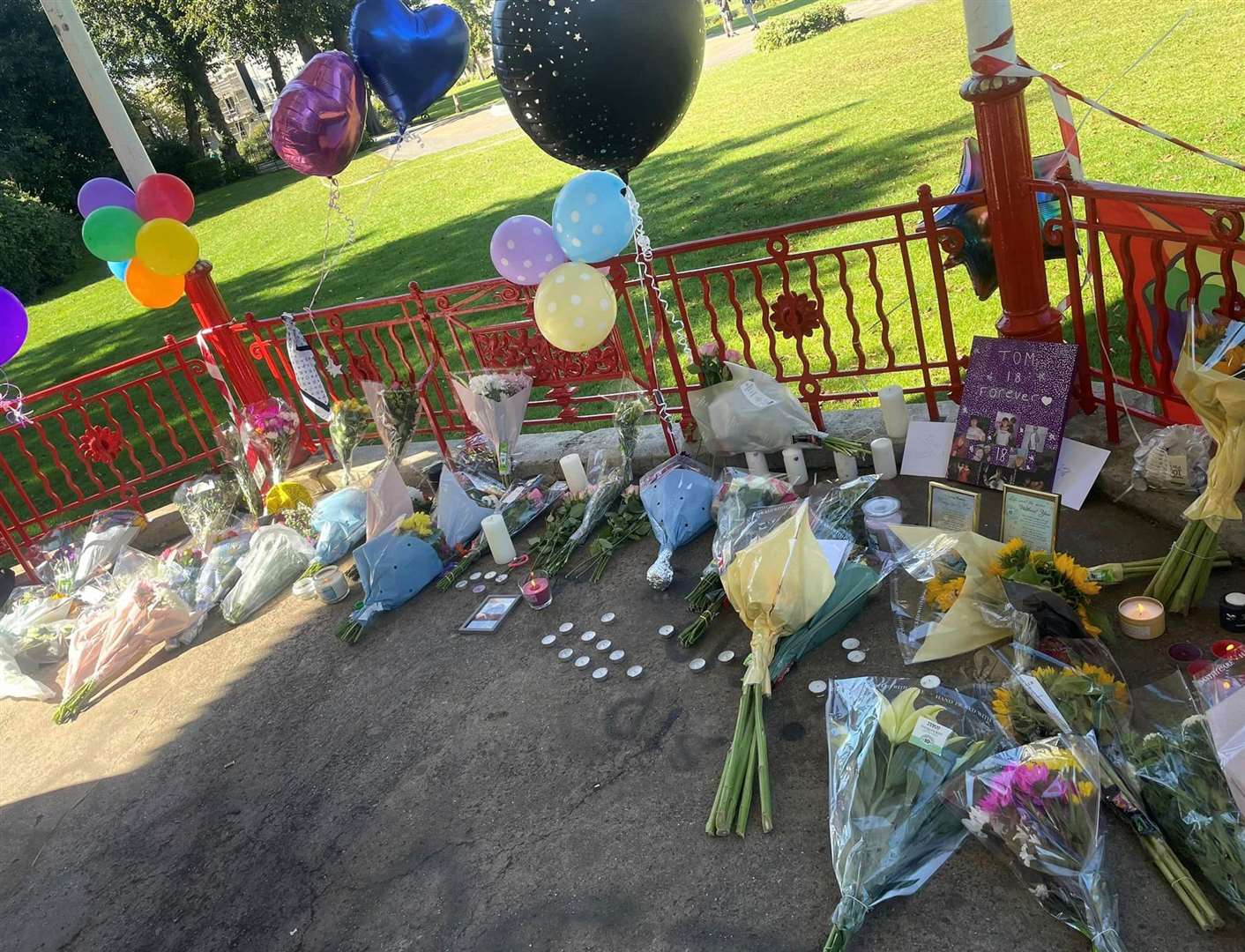 Flowers were left for Tom Watson in Dane John Gardens, Canterbury