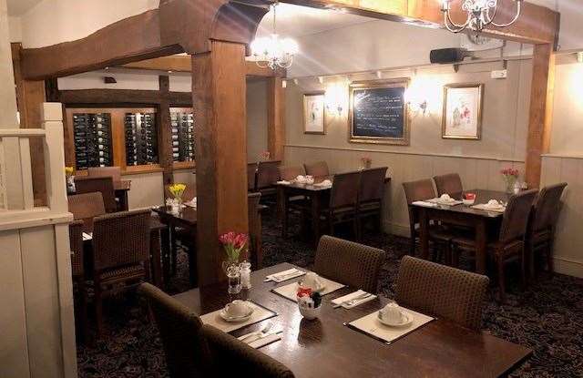 This section of the dining room, on the left-hand side of the pub, had already been set out ready for breakfast the following morning