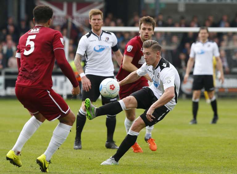 Andy Pugh gets away from Chelmsford captain Chris Bush. Picture: Andy Jones