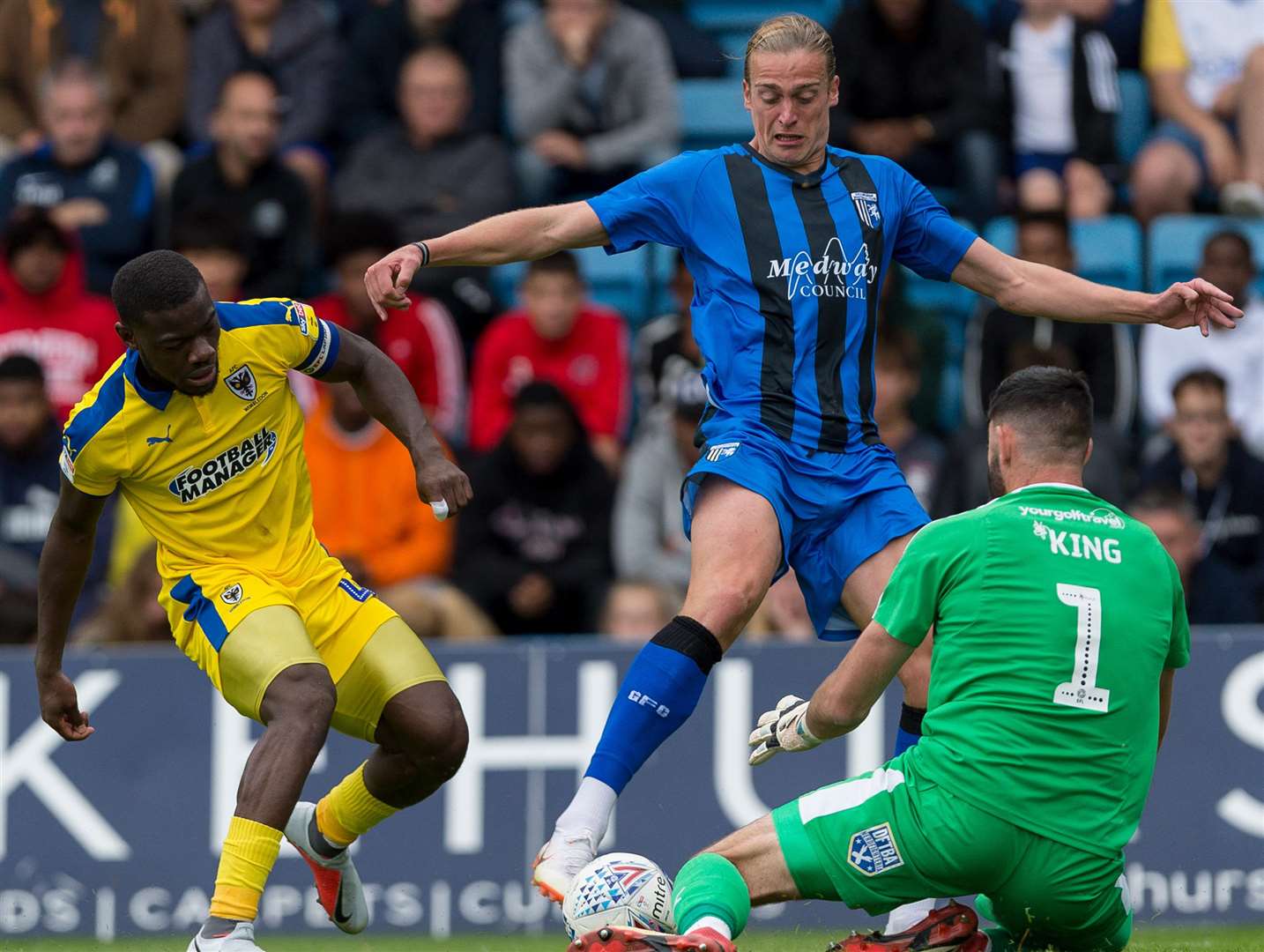 Tom Eaves is denied by Dons keeper Tom King Picture: Ady Kerry