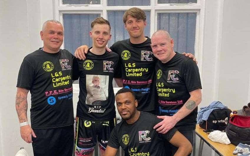 Robert Caswell’s team pose for a photo as he enjoys another night at York Hall