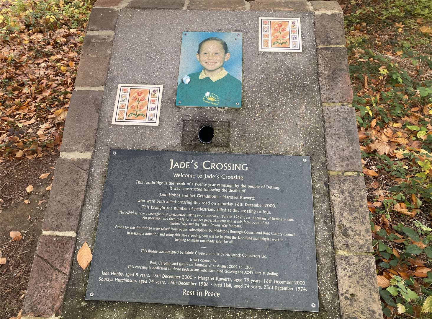 A plaque at the foot of the Jade's Crossing bridge over the A249 at Detling Hill