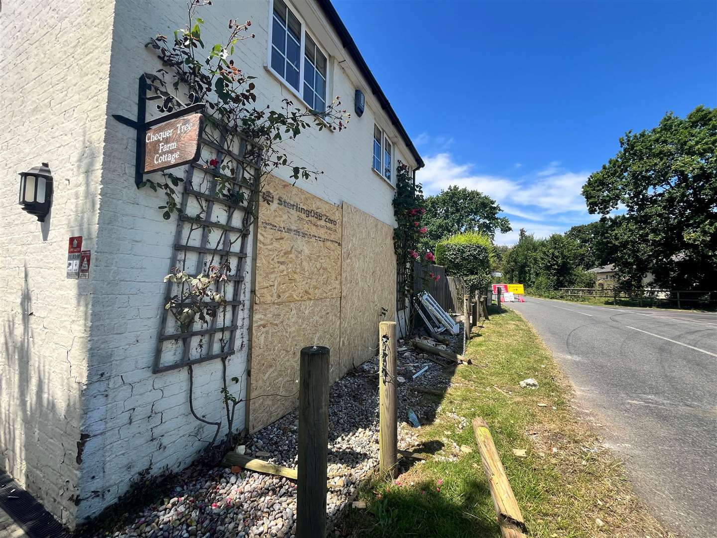 The front of her property was boarded up overnight following the crash