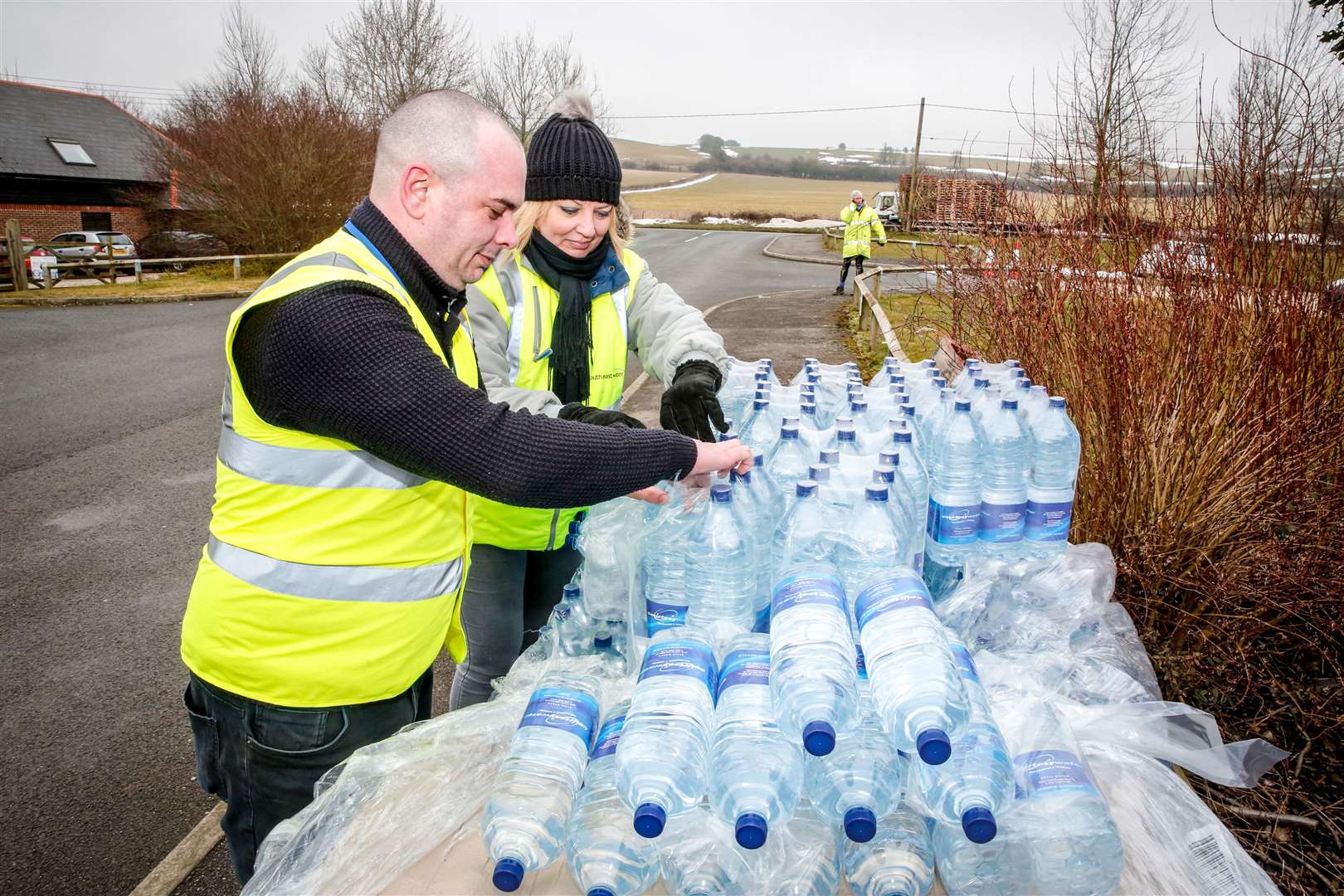 Bottled water stations have been set up. Stock photo