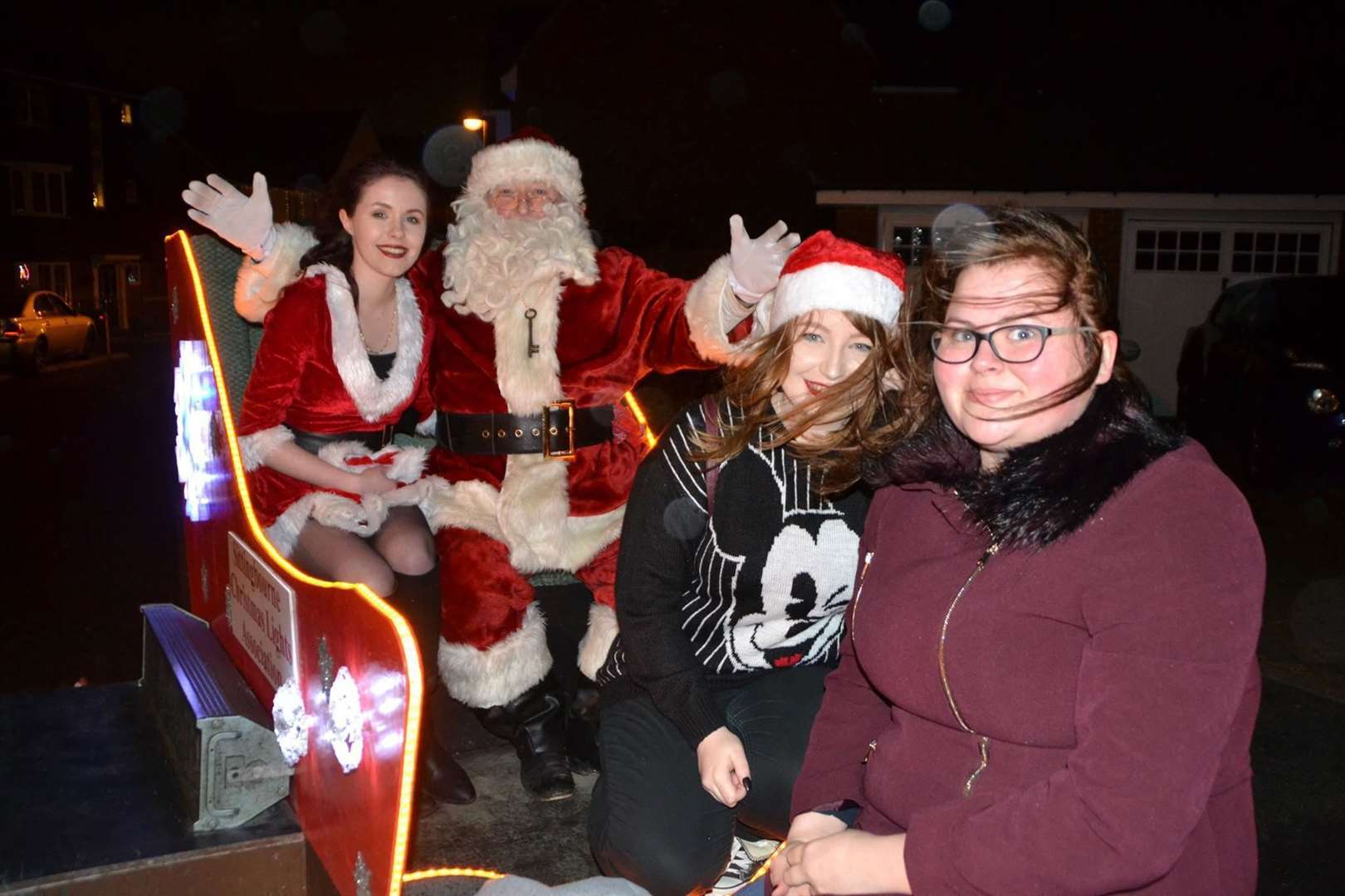 Santa and his helpers on the Sittingbourne Christmas Lights Association sleigh. Stock photo