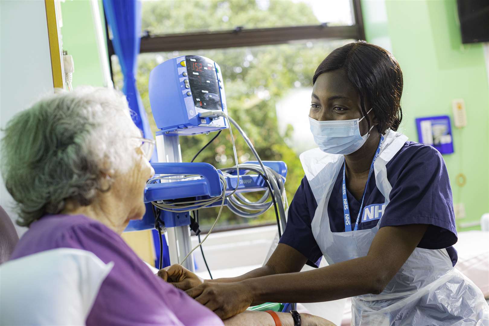 Nurse Yetty Alao with a patient