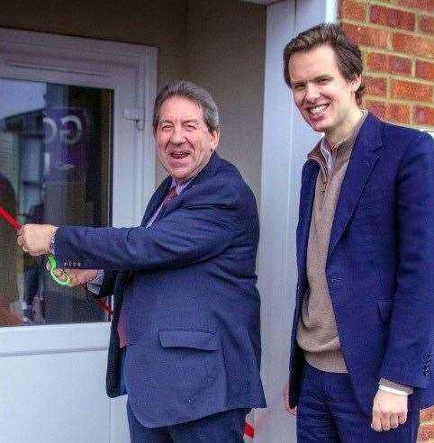 Sittingbourne and Sheppey MP Gordon Henderson cuts a ribbon to reopen the Golden Leas clubhouse at Minster, Sheppey, after a £500,000 refit, watched by boss Raoul Fraser