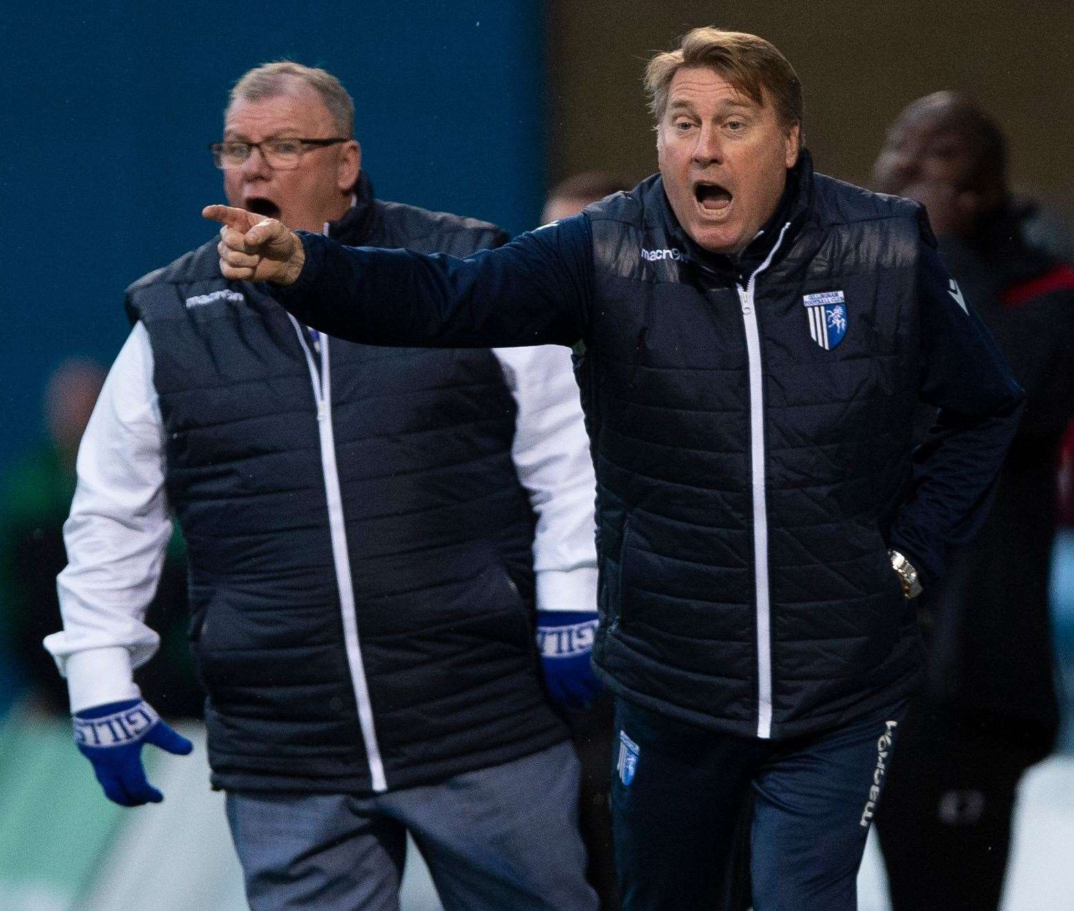 Assistant boss Paul Raynor and manager Steve Evans roar Gills on against Doncaster Picture: Ady Kerry