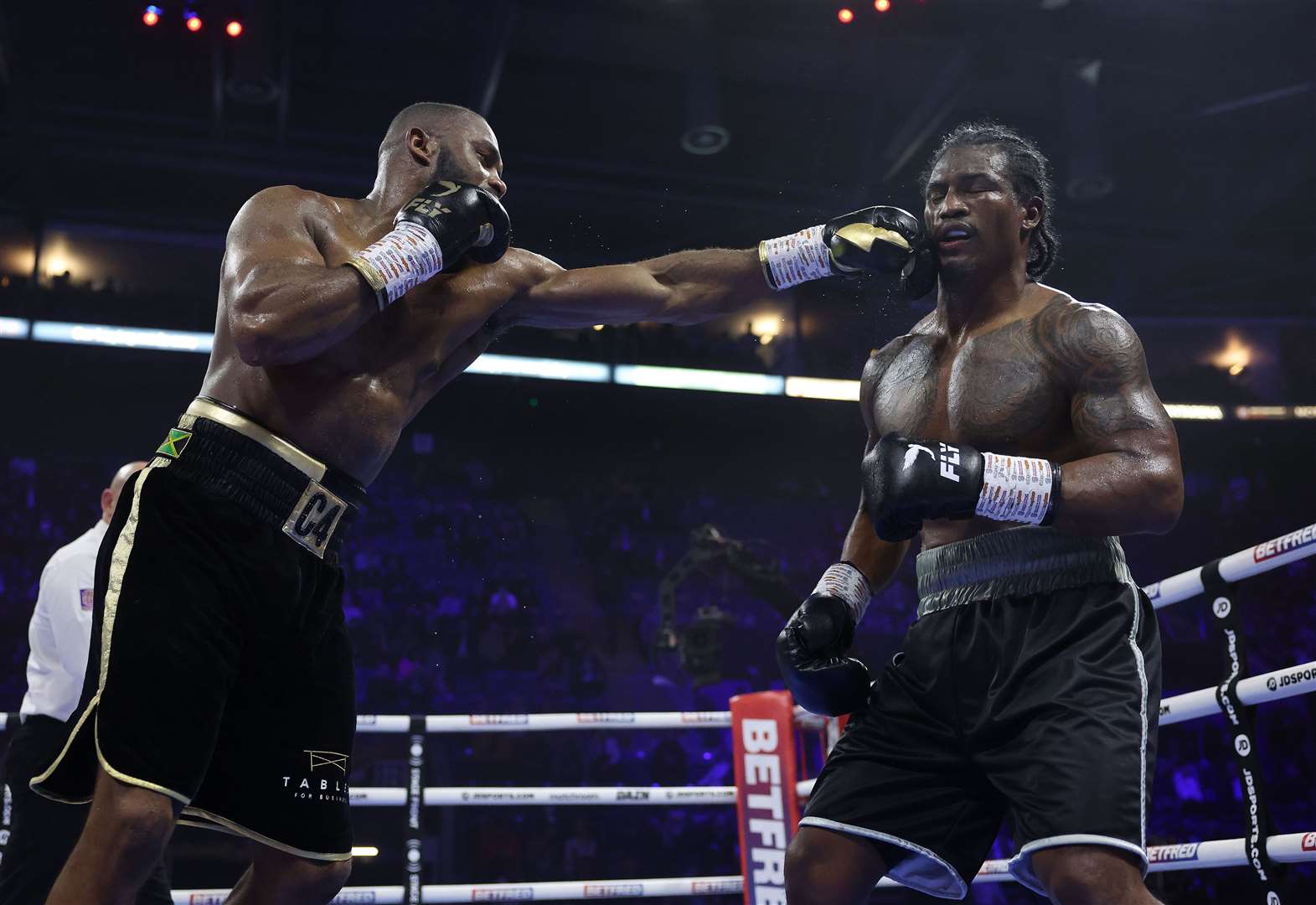 Cheavon Clarke lands a punch on opponent Israel Duffus during Saturday night's cruiserweight contest Picture: Mark Robinson/Matchroom Boxing