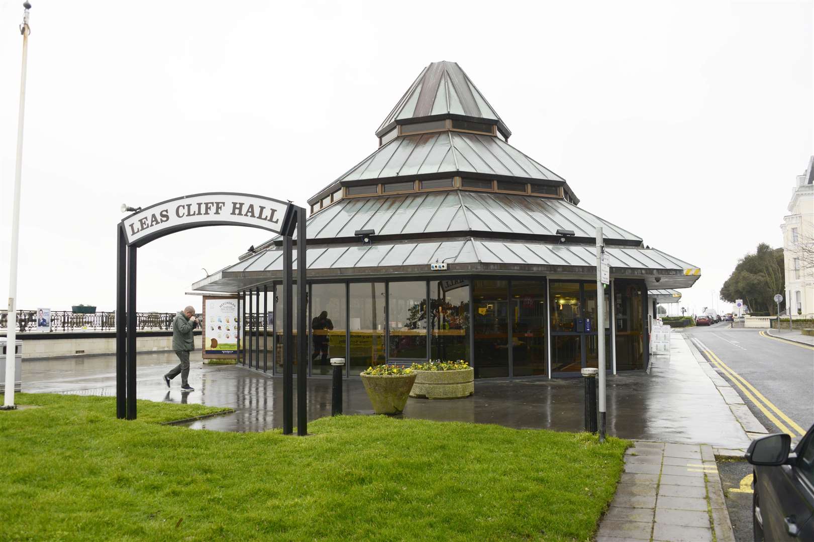 Thomas started hitting windows at the Folkestone's Leas Cliff Hall with a metal bar