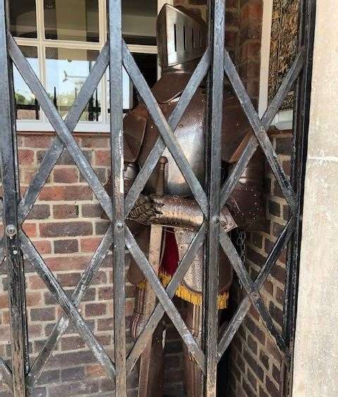 The metal shutter was closed but even if you had got beyond that there was an armoured guard on duty