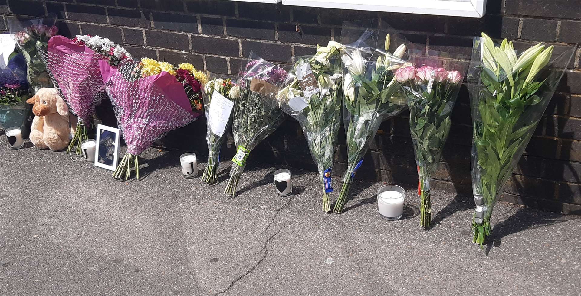 Floral tributes left outside Swanley station