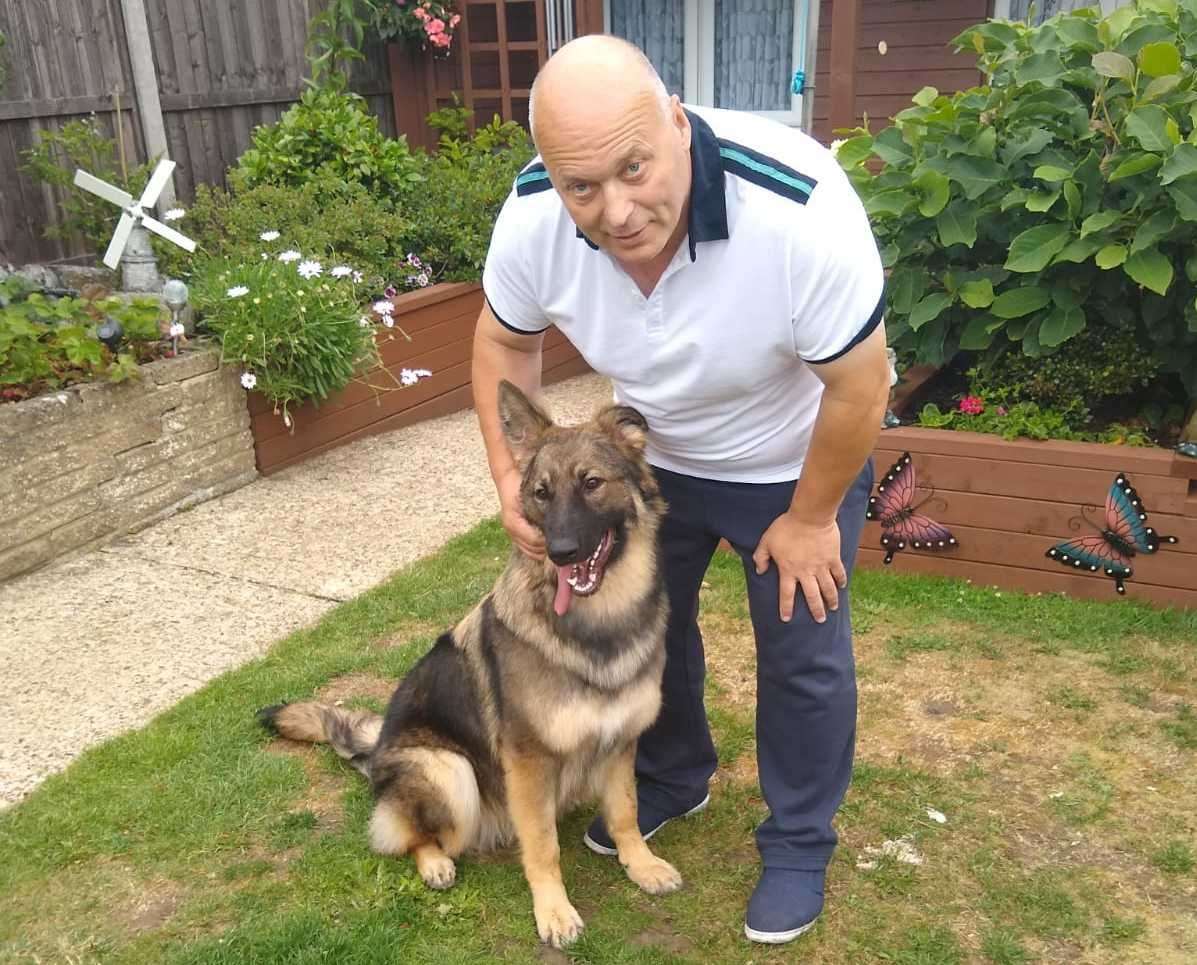 Roy loved gardening and playing with his dog, Tess. Picture: Karen Wright