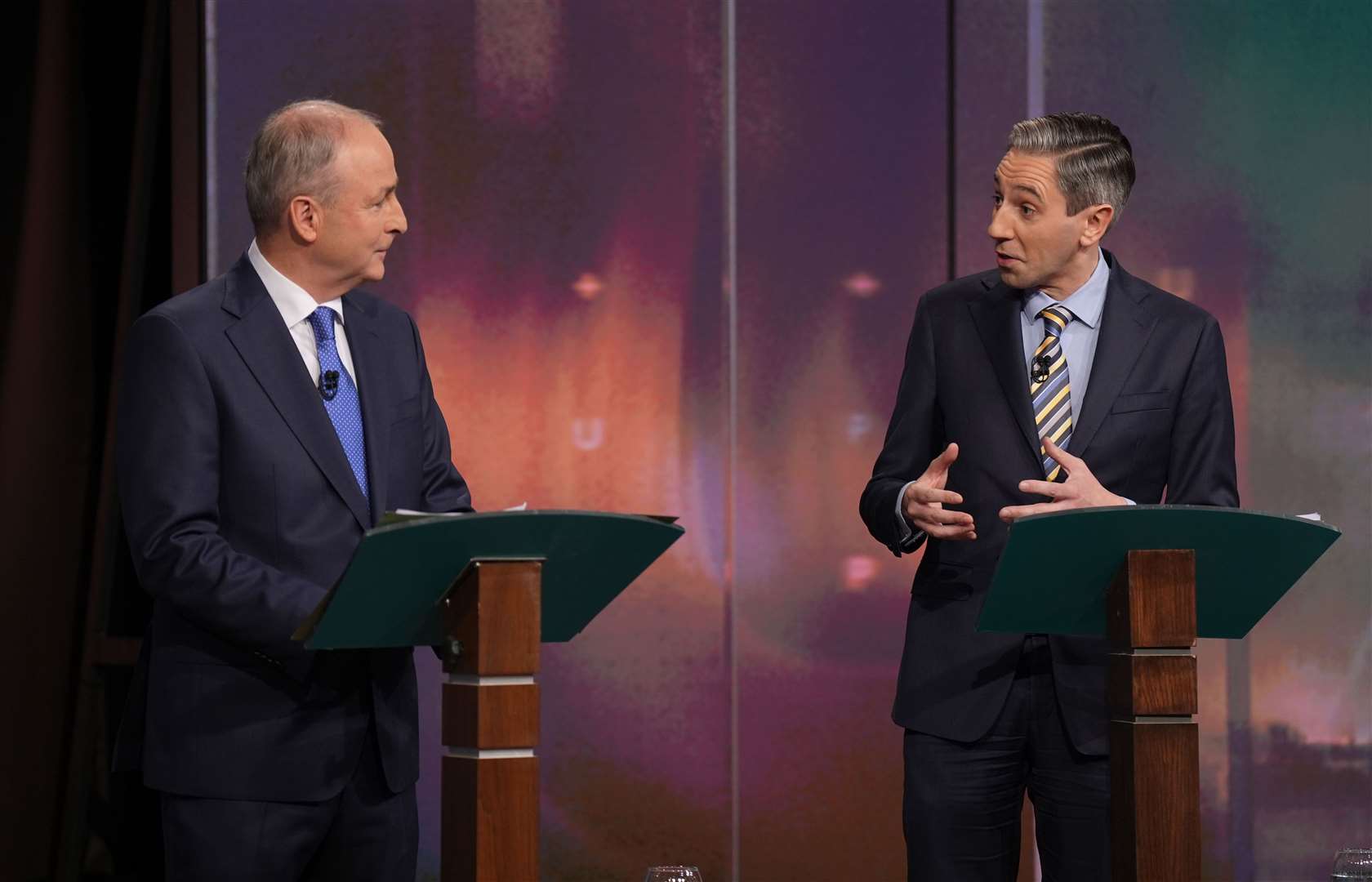 Tanaiste and leader of Fianna Fail, Micheal Martin (left) and Taoiseach and leader of Fine Gael, Simon Harris during the General Election leaders’ debate (Niall Carson/PA)