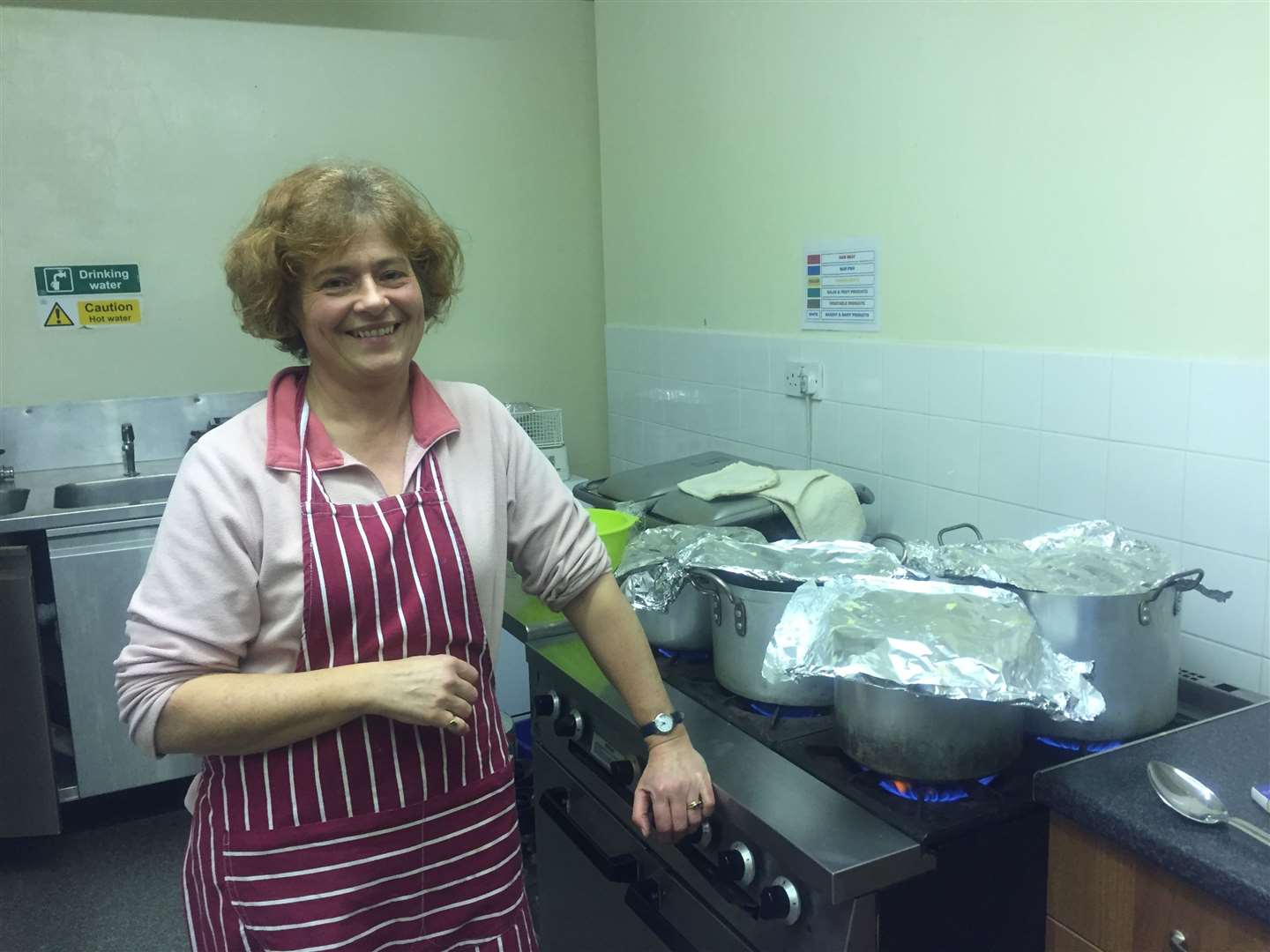 Volunteer Annie Bentley helps out in the kitchen