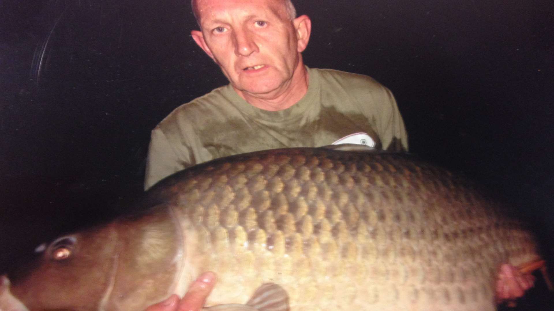 Malcolm Down after catching a fish