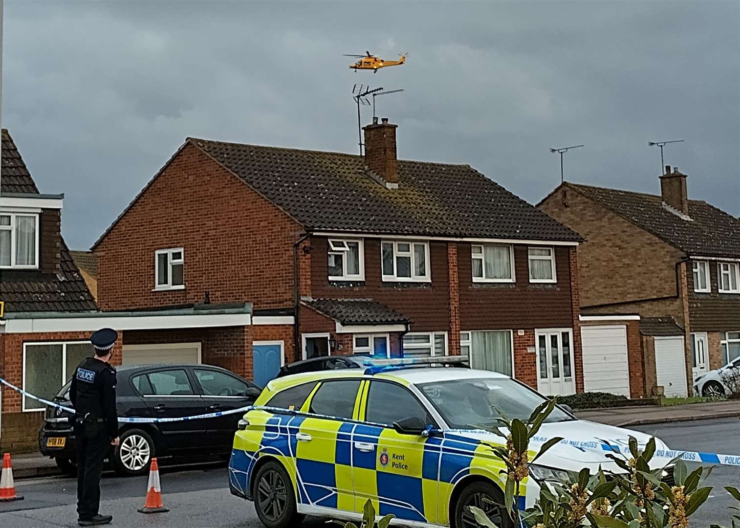 The closed road with the air ambulance approaching after the stabbing in Adelaide Road, Sittingbourne