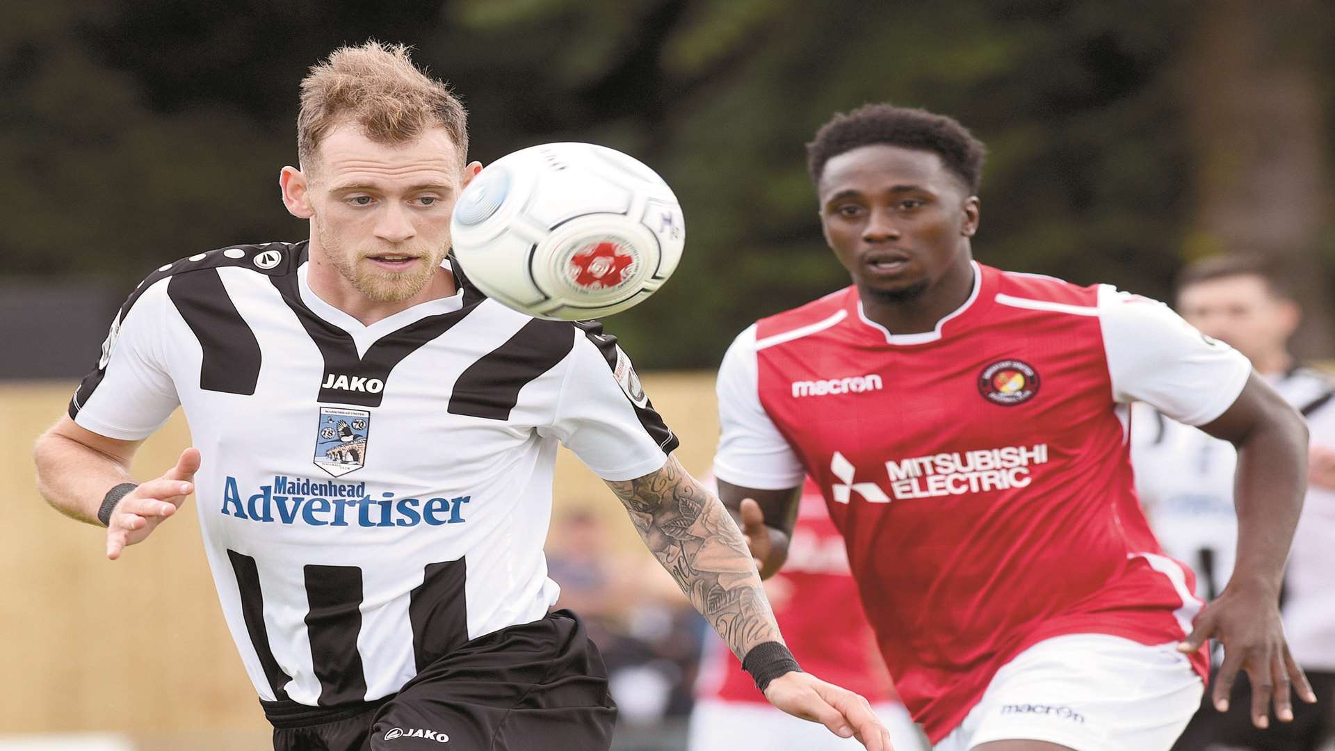 Marvin McCoy tracks Maidenhead goalscorer Harry Pritchard Picture: Nick Parford (Baylis Media)