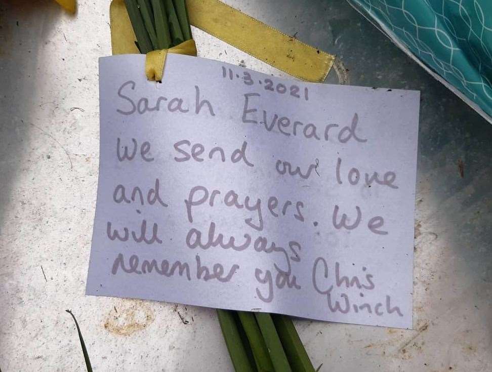 One of many floral tributes at the site entrance