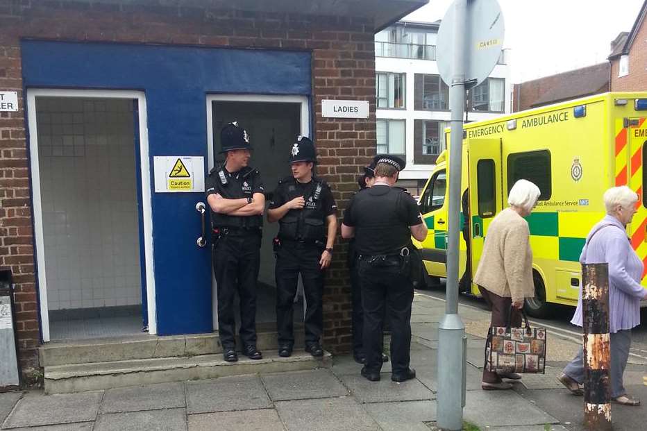 The public toilets in Canterbury Lane being guarded by police following the death of Emma Slater