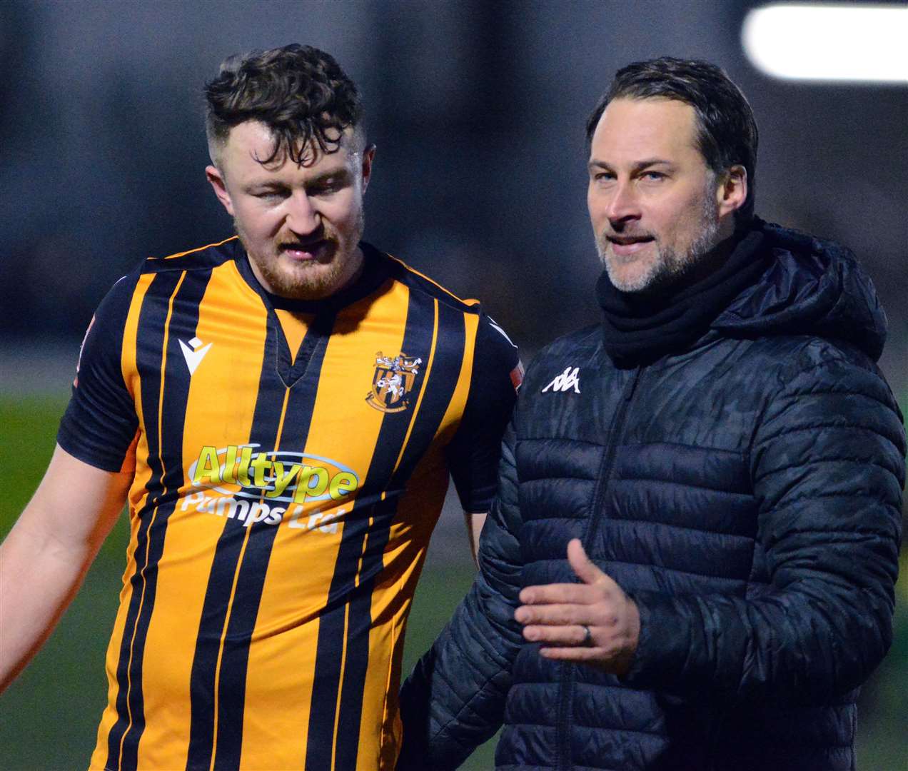 Folkestone joint-head coach Micheal Everitt and defender Callum Davies confer after the match. Picture: Randolph File