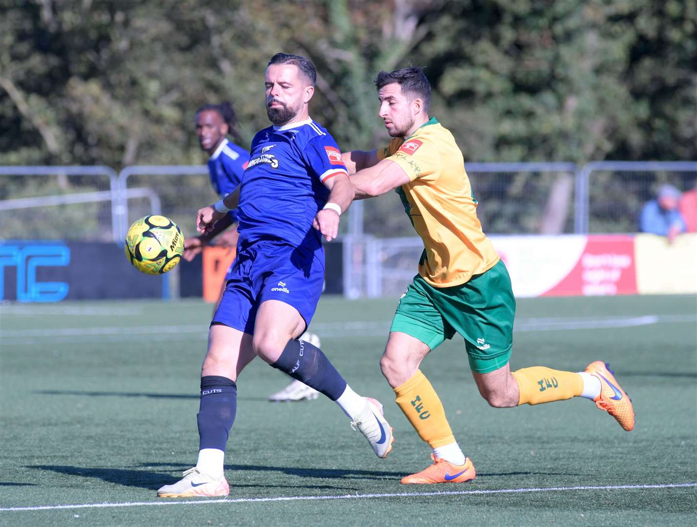 Margate player-manager Ben Greenhalgh gives Ibrahim Olutade plenty of supply. Picture: Stuart Watson