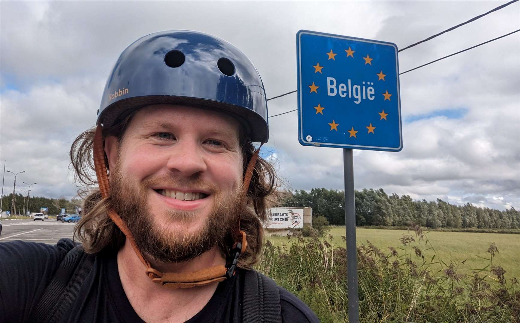 Reporter Rhys Griffiths crossing the border from France into Belgium